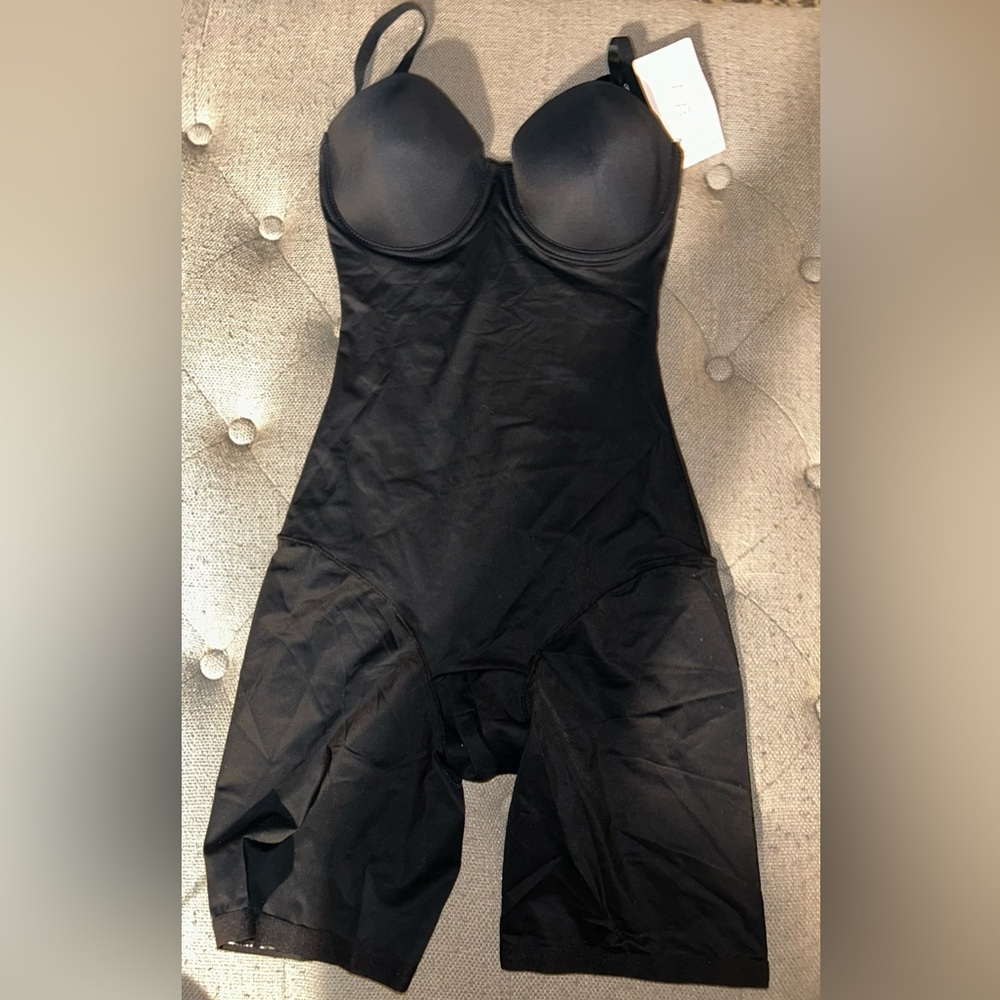 NWT Enhance your silhouette with this black shapewear bodysuit. SMALL